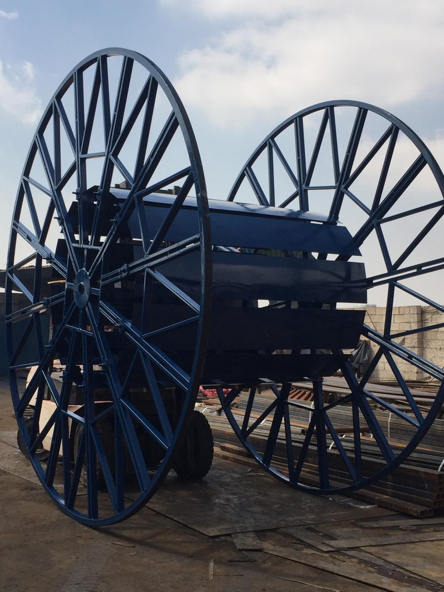 Large blue steel cable drum frames fabricated in the yard